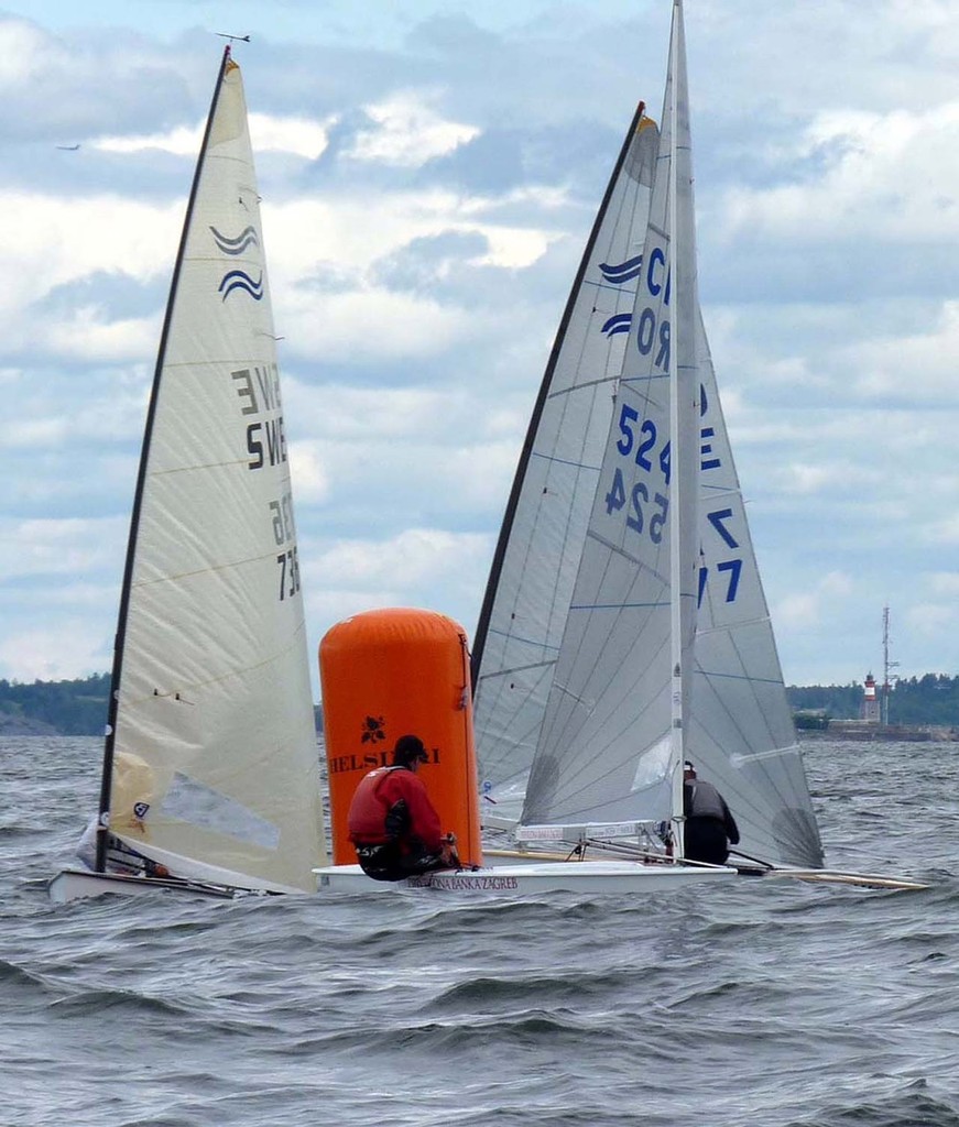 Close at the top mark in Race 9 of the Finn Europeans 2011 © Robert Deaves/Finn Class http://www.finnclass.org